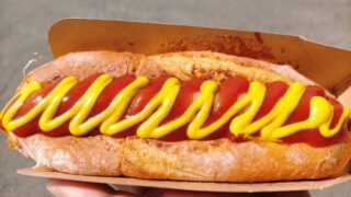 Japanese street food - hot dogs cooked in a small food truck
